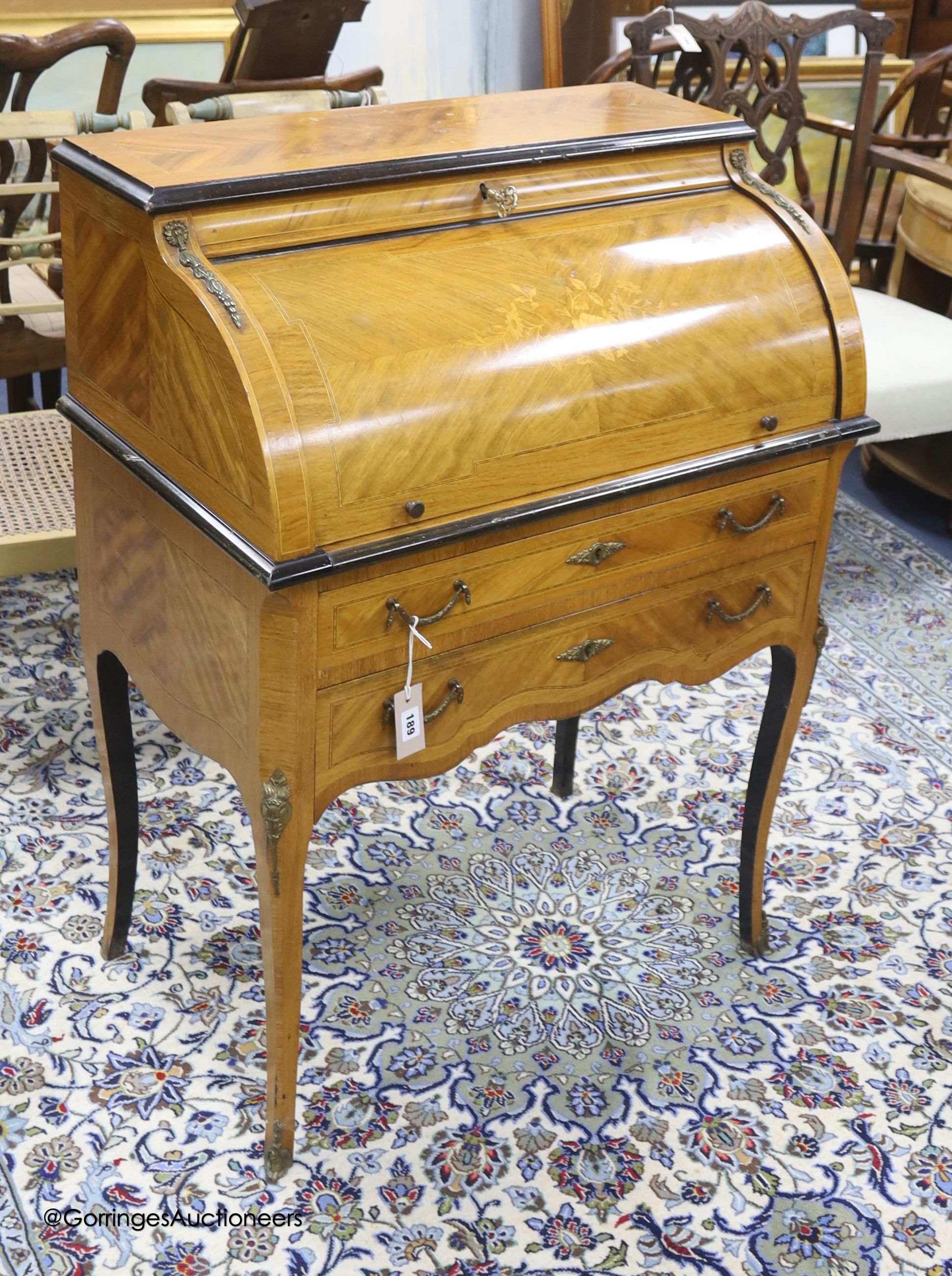 A Louis XVI style marquetry inlaid kingwood cylinder bureau, width 74cm depth 45cm height 102cm